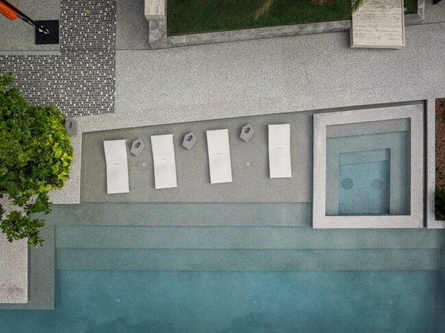 Luxury Pool Hardscape Design: The Architectural Bridge to Aquatic Excellence
