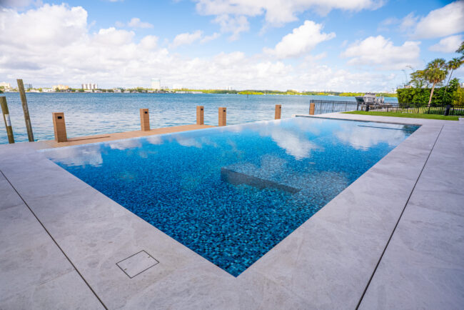 Mastering the Mirror: A Guide to Knife Edge Pool Builders in Florida