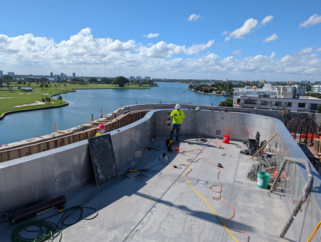 Inside the stainless steel pool shell, looking out over the water