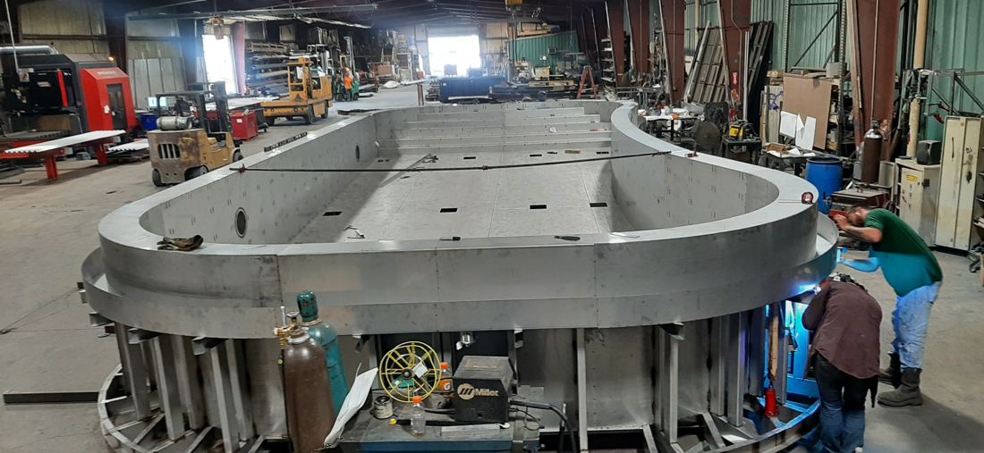 Finished stainless steel pool shell inside the fabrication shop